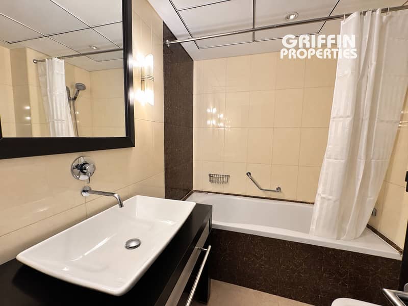 12 Bright, decluttered rental bathroom-2. png
