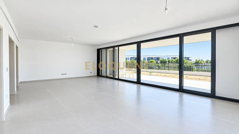 3 Bright Minimalist Living Room with Patio Views. png