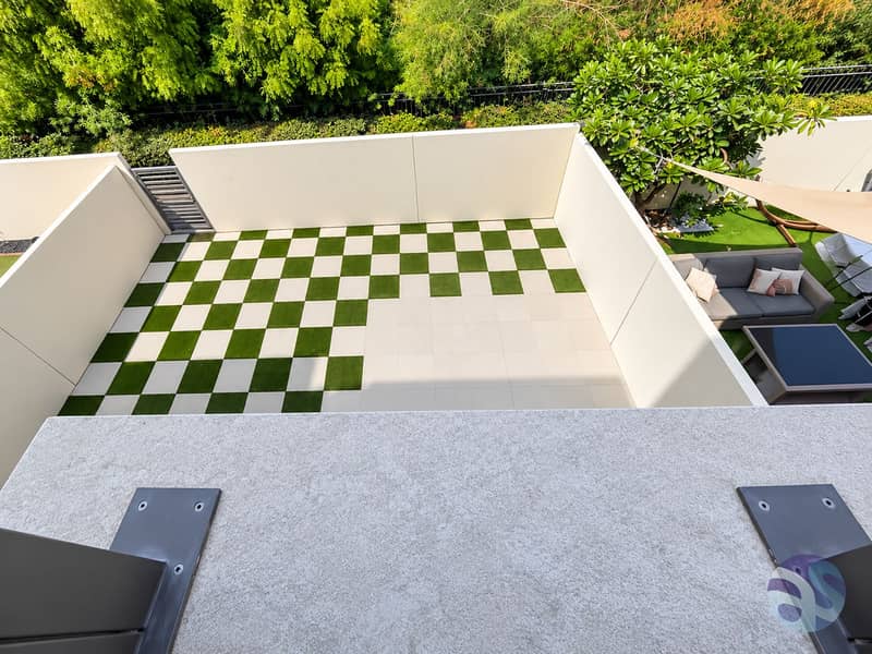 13 Modern Sunlit Checkerboard Courtyard. png