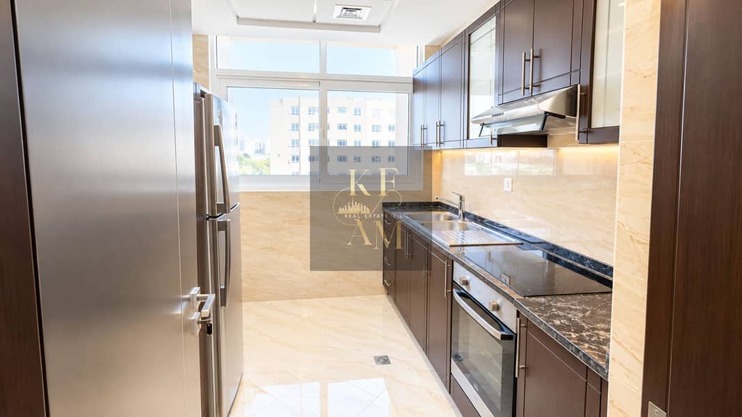 9 Modern Galley Kitchen with City Views. png