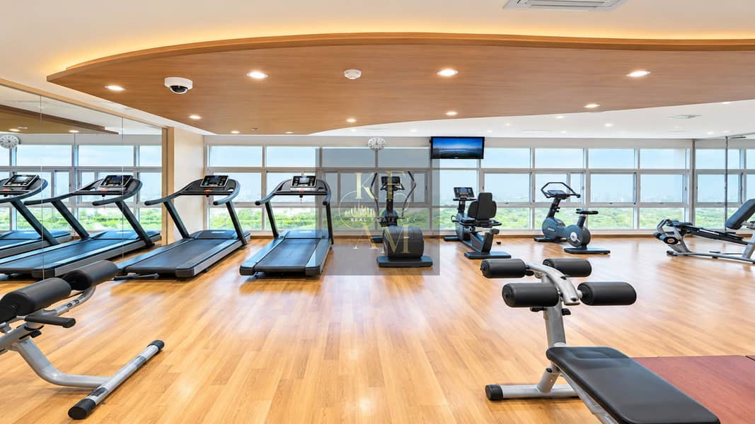 13 Bright Modern Gym with Panoramic City Views. png