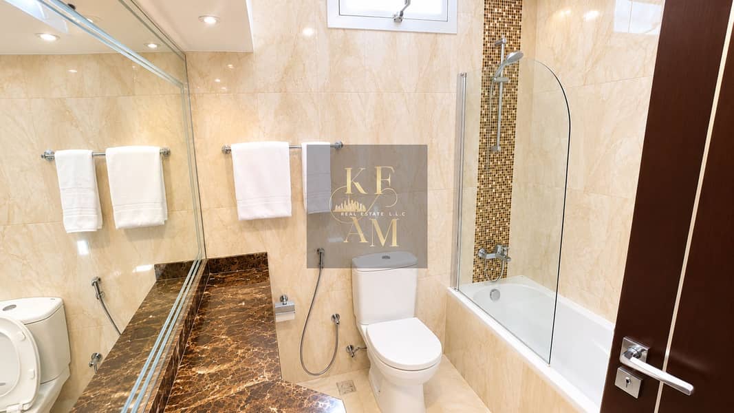 15 Luxurious Beige Marble Bathroom. png