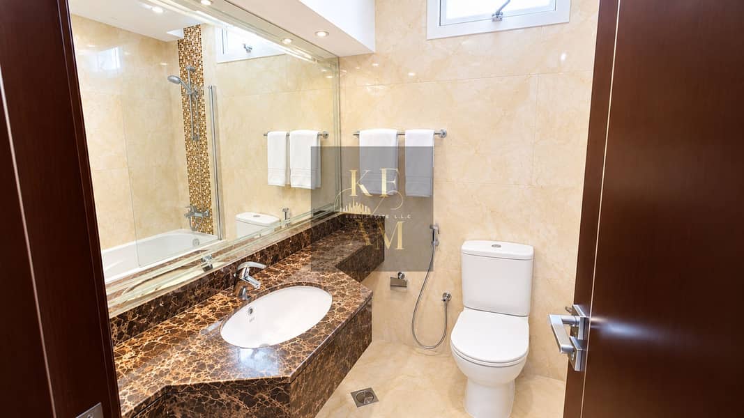 17 Upscale Marble Hotel Bathroom. png