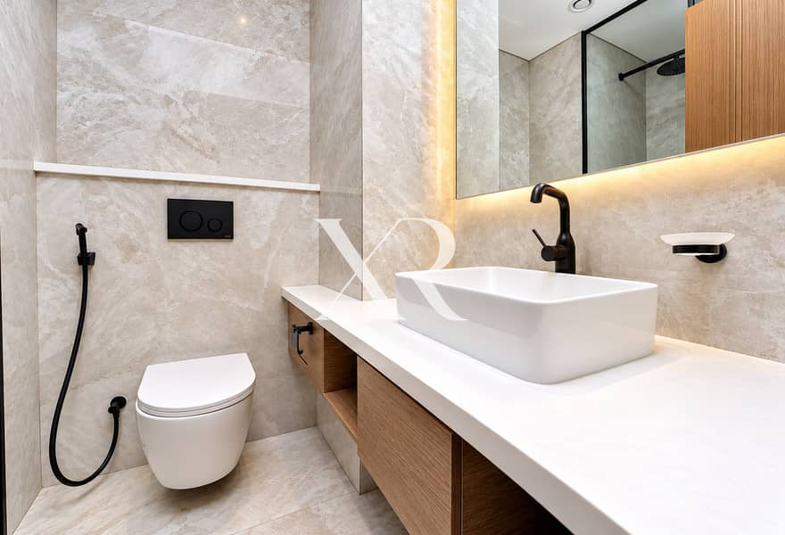 10 Modern Marble Bathroom with Warm Lighting. png