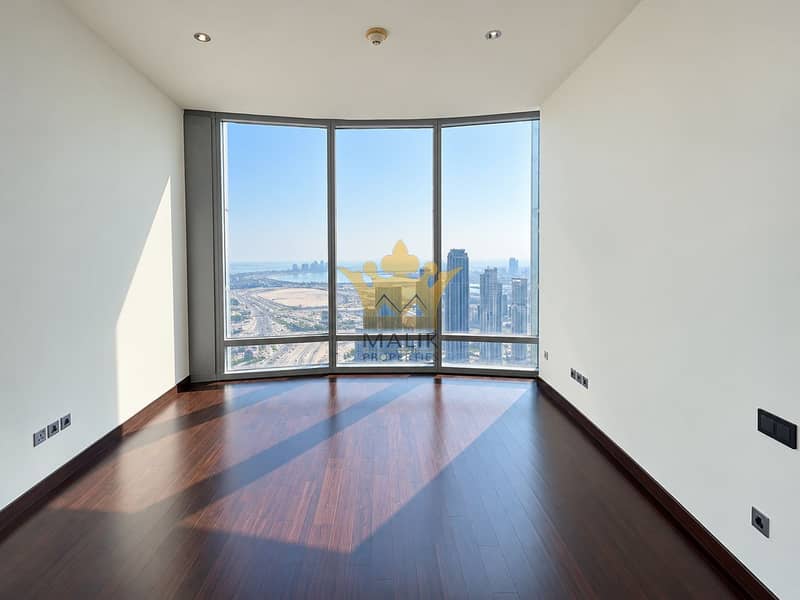 8 Empty High-Rise Room with Skyline View. png