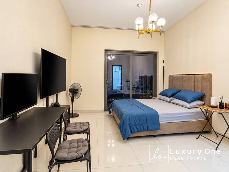5 Modern Bedroom with Desk and Balcony Views. png