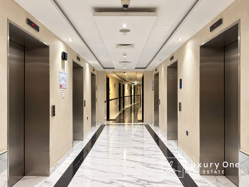 9 Symmetrical Modern Elevator Lobby. png