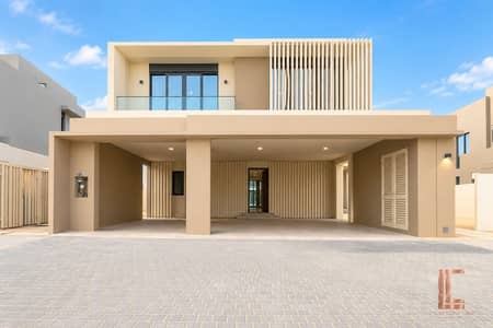 杰贝阿里村， 迪拜 5 卧室别墅待售 - Minimalist Beige Villa with Glass Balcony. png