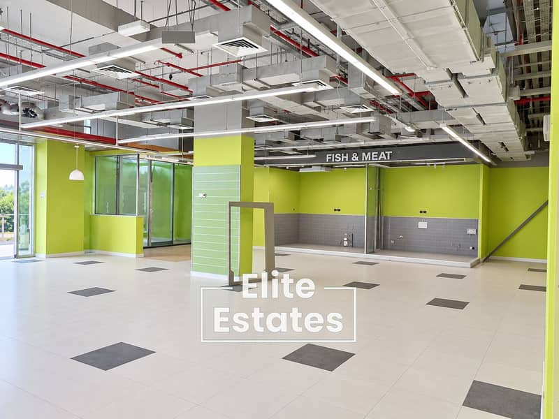 2 Empty Lime-Green Fish & Meat Retail Space. png