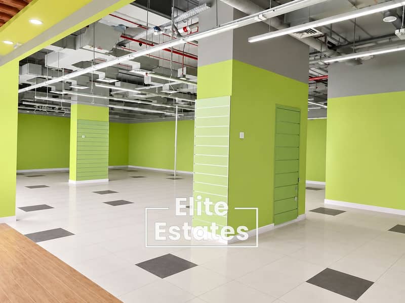 4 Spacious Green Industrial Retail Interior. png