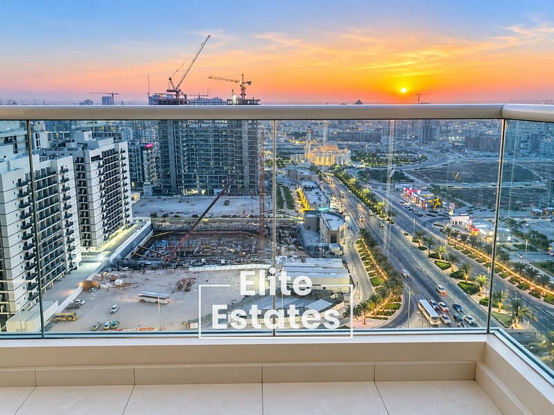 9 Golden Hour City Skyline from a Balcony. png
