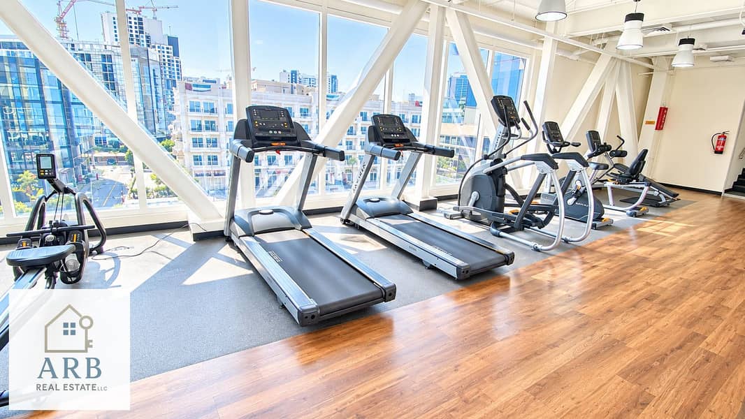 11 Sunlit Modern Gym with City Views. png