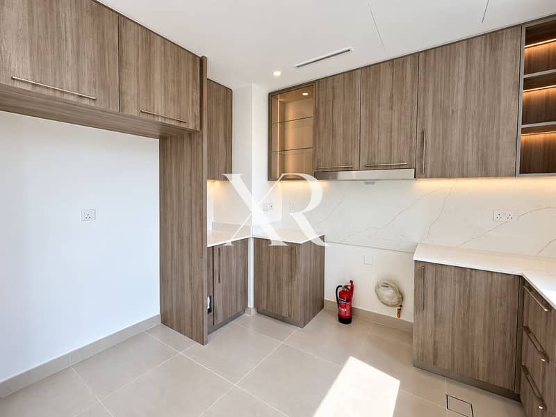 4 Bright kitchen with warm wood cabinetry. png