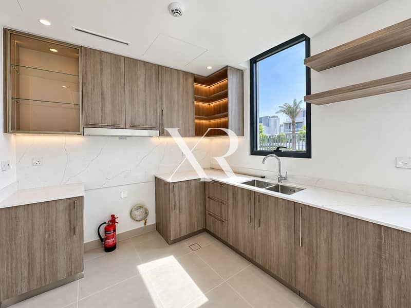 5 Bright modern kitchen with corner shelves. png