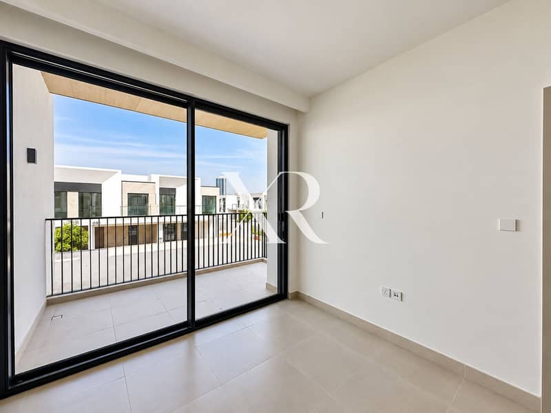 16 Brightened bedroom and balcony view. png