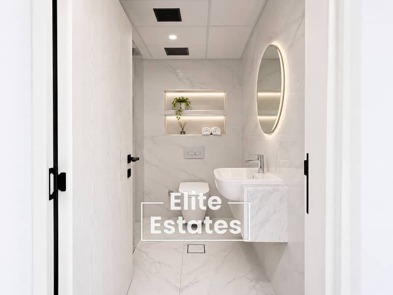 6 Modern Marble Bathroom with Warm LED Niches. png