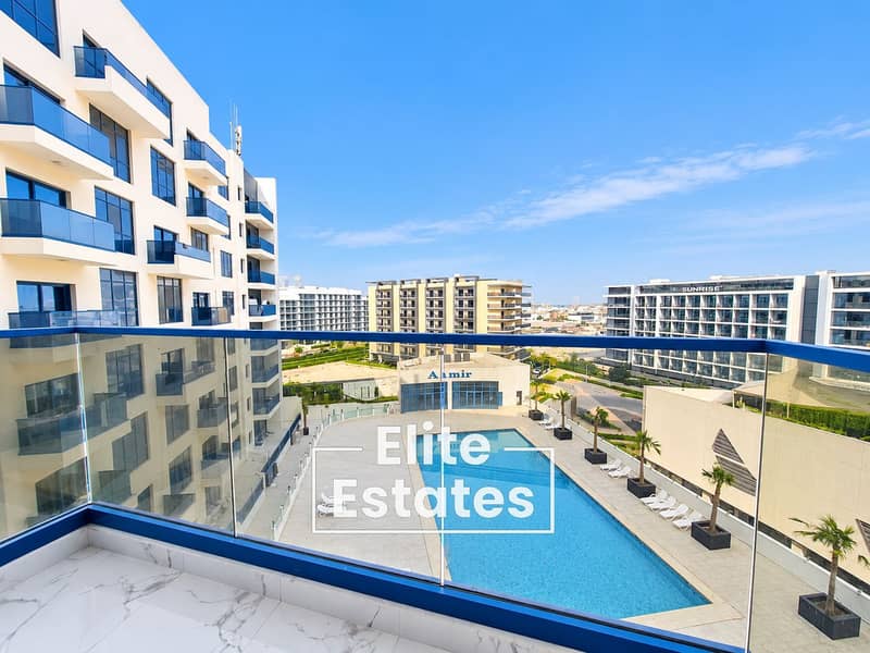 7 Sunlit Balcony Overlooking Modern Pool Complex. png
