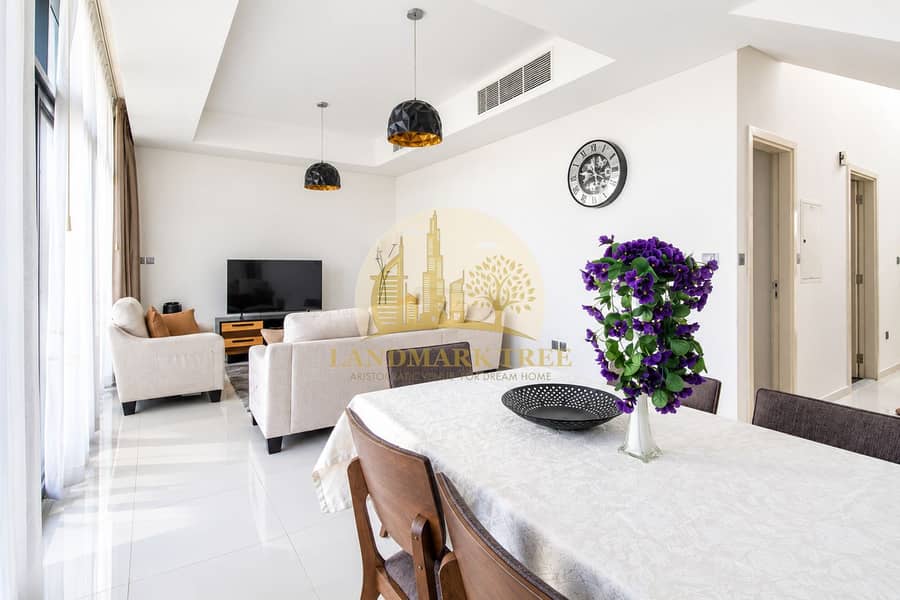 3 Minimalist Living Room with Purple Flowers. png