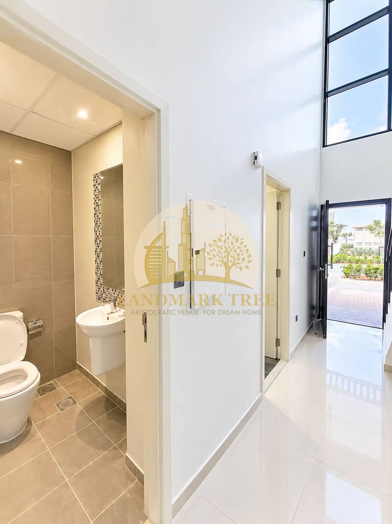 6 Bright Modern Hallway with Open Bathroom. png