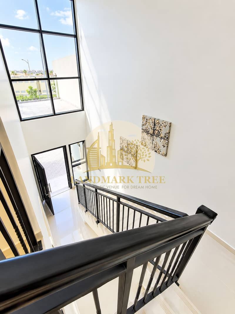 7 Bright Modern Stairwell with City Views. png