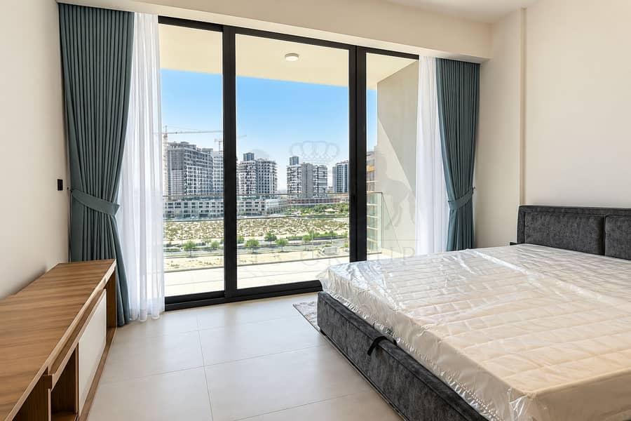 2 Modern Bedroom with Urban Balcony View. png