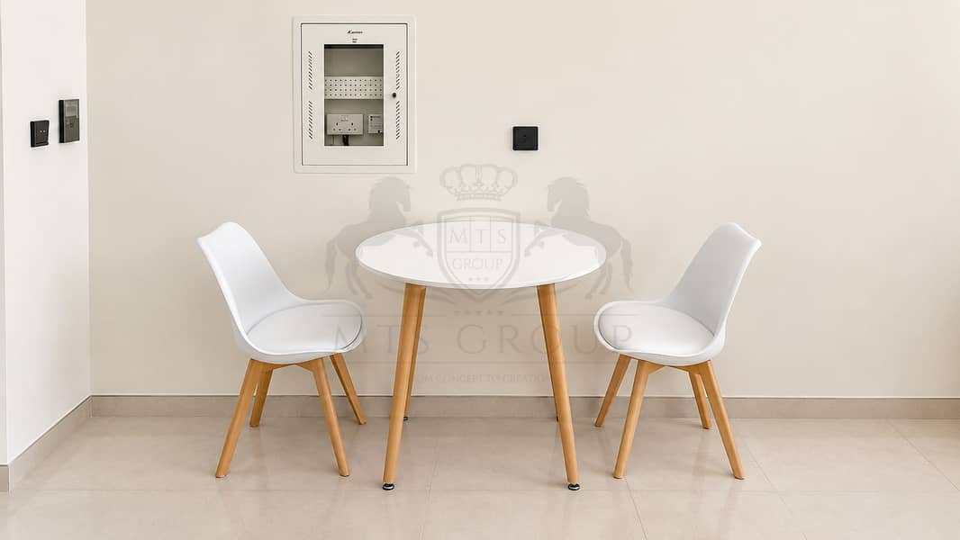4 Minimalist Nook with Round Table and Chairs. png