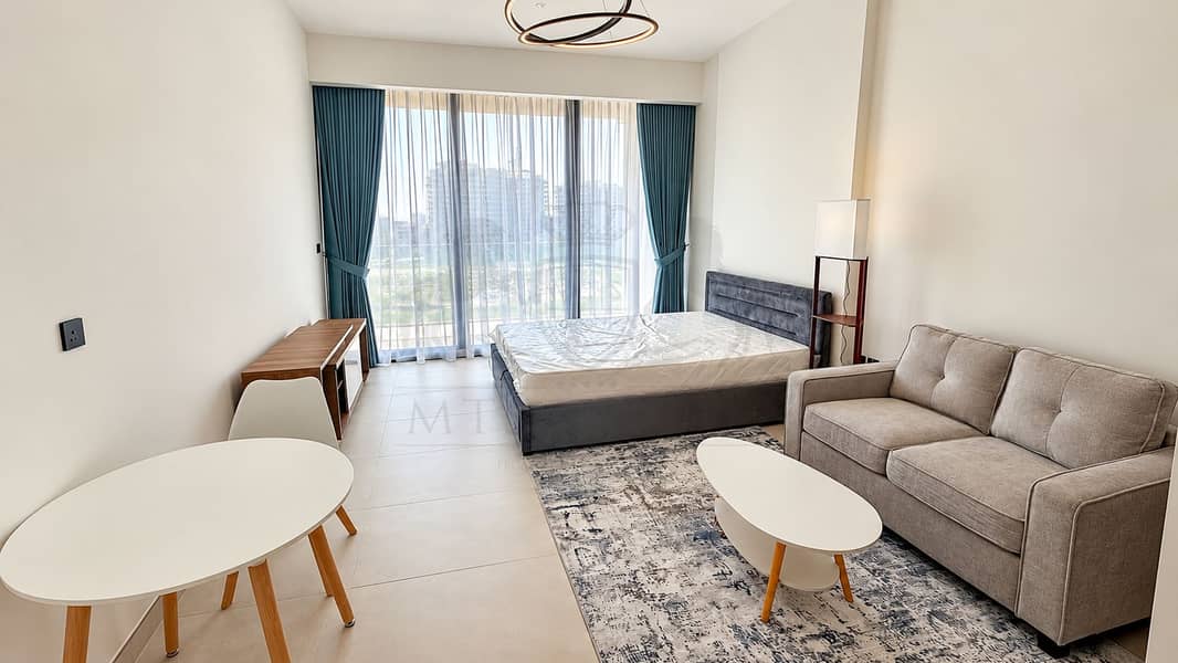 13 Modern Studio Apartment with Teal Curtains. png