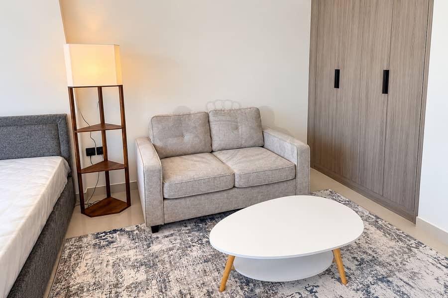 14 Modern Studio with Cozy Seating. png