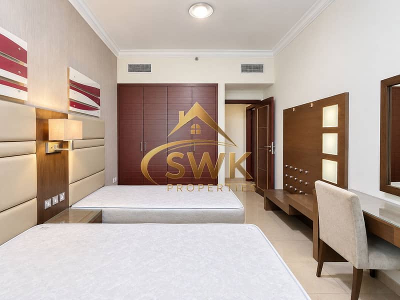 2 Modern Twin-Bed Hotel Room. png