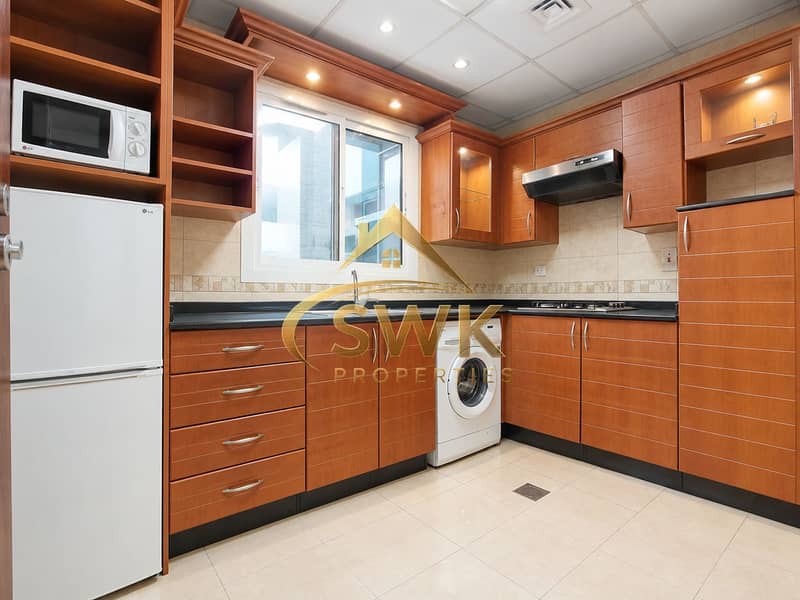 4 Warm Wood L-Shaped Kitchen Interior. png