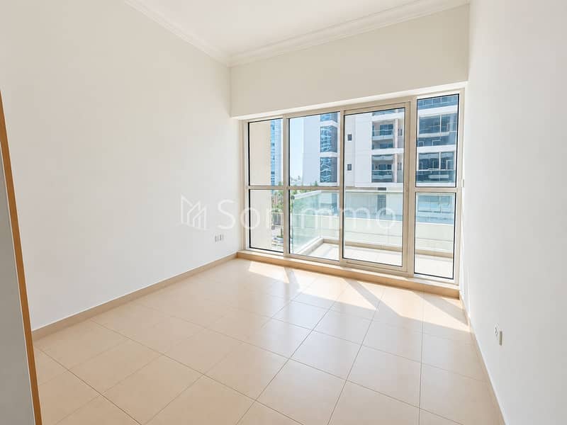 6 Sunlit Modern Apartment with Balcony Views. png