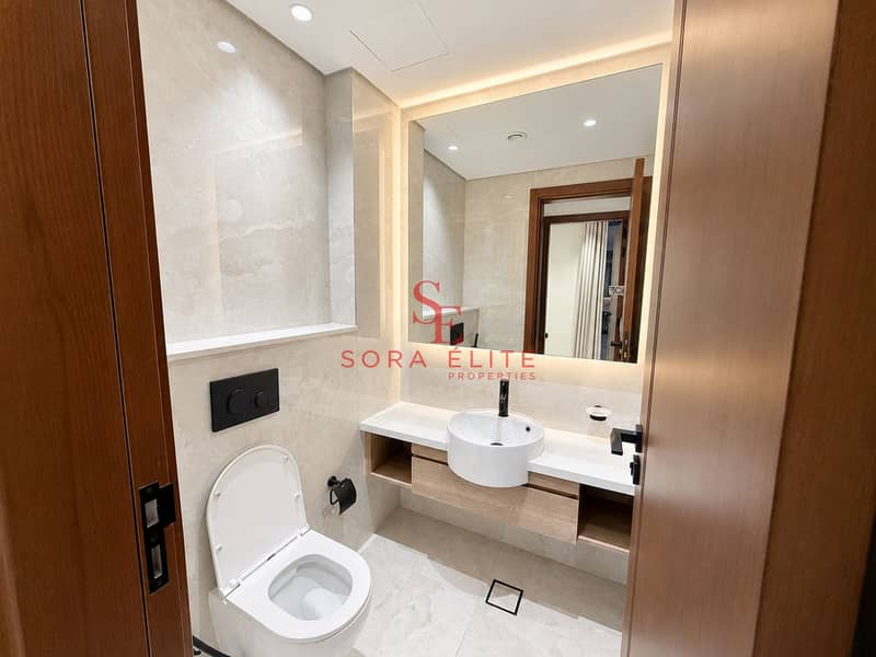 11 Bright Minimalist Marble Bathroom. png