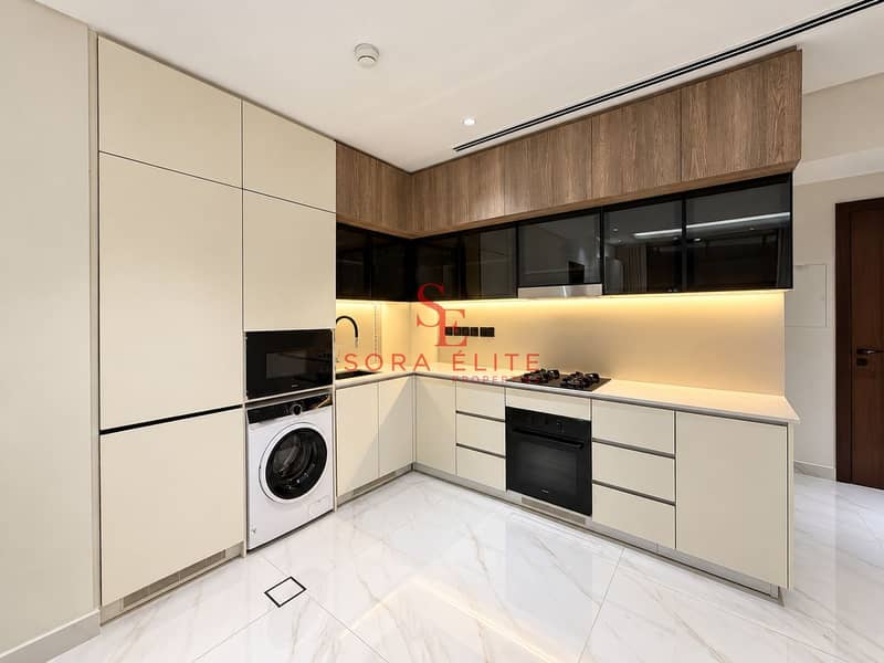 7 Modern Cream and Wood L-Shaped Kitchen. png