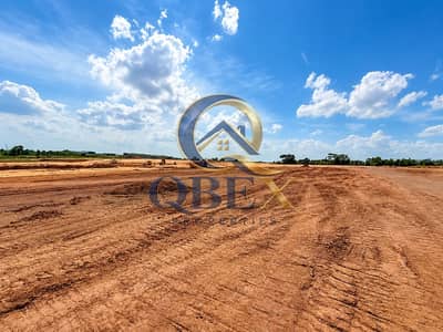 ارض صناعية للبيع في أم ديرا، أم القيوين - Expansive Earthwork Site Under Open Skies. png ارض صناعية للبيع في أم ديرا، أم القيوين - Expansive Earthwork Site Under Open Skies. png