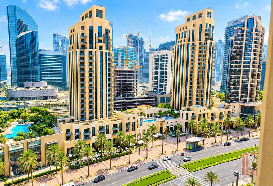 7 Sunlit Emaar Skyline with Pools. png