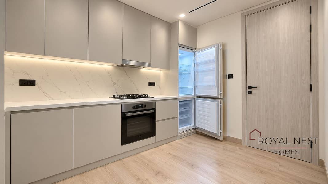 3 Modern Kitchen with Open Refrigerator. png