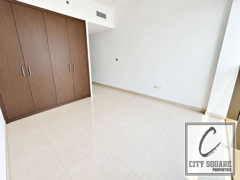 9 resize_Sunlit Minimal Apartment with Wood Wardrobe. png