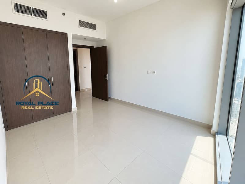 6 Sunlit Minimalist Room with Open Door (1). png