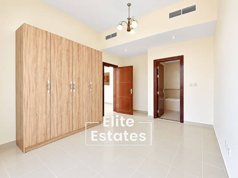 4 Minimal Cream Bedroom with Oak Wardrobe. png