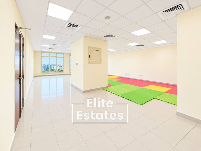 10 Bright Multipurpose Room with Colourful Play Mats. png