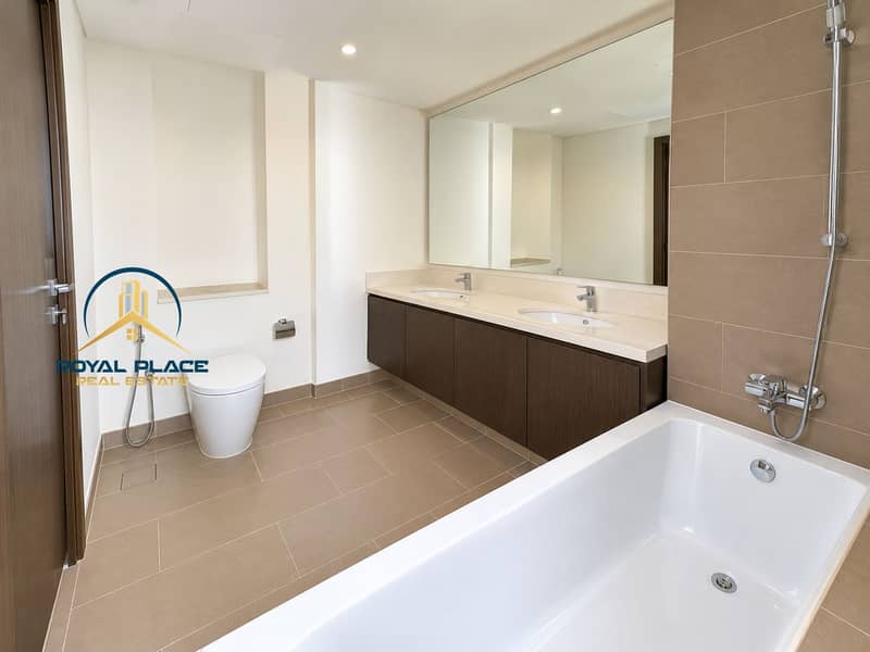 4 Modern Taupe-Tiled Bathroom Interior. png
