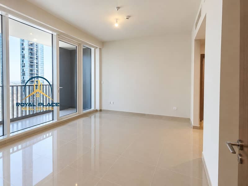 4 Bright Empty Living Room with Balcony Views. png