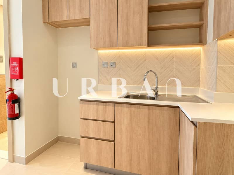 3 Modern Kitchenette with Fire Safety Station. png