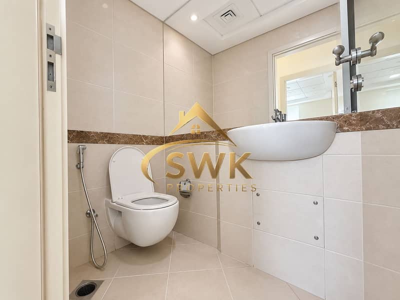 8 Modern Beige Tile Bathroom. png