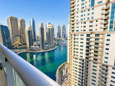 2 Cпальни Апартаменты в аренду в Дубай Марина, Дубай - Dubai Marina Skyline from a Balcony. png 2 Cпальни Апартаменты в аренду в Дубай Марина, Дубай - Dubai Marina Skyline from a Balcony. png