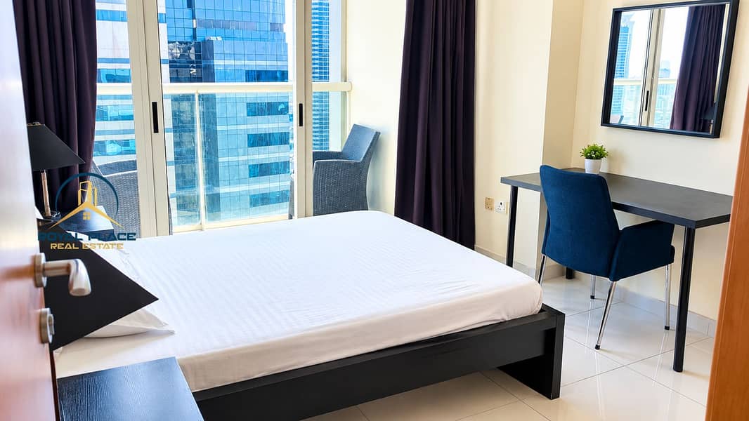 6 Modern High-Rise Bedroom with City View. png