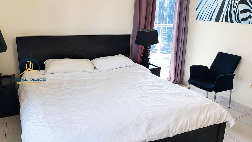 7 Bright Minimalist Bedroom with City View. png