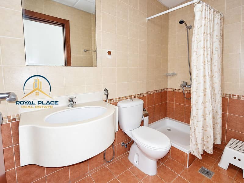 9 Bright Terracotta-Tiled Bathroom. png