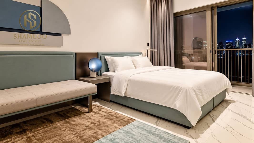 2 Modern Hotel Bedroom with City Views. png