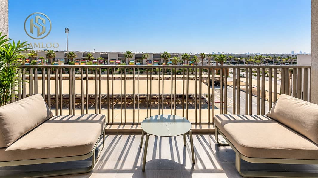 6 Sunny Modern Balcony Overlooking Palm-Lined Complex. png
